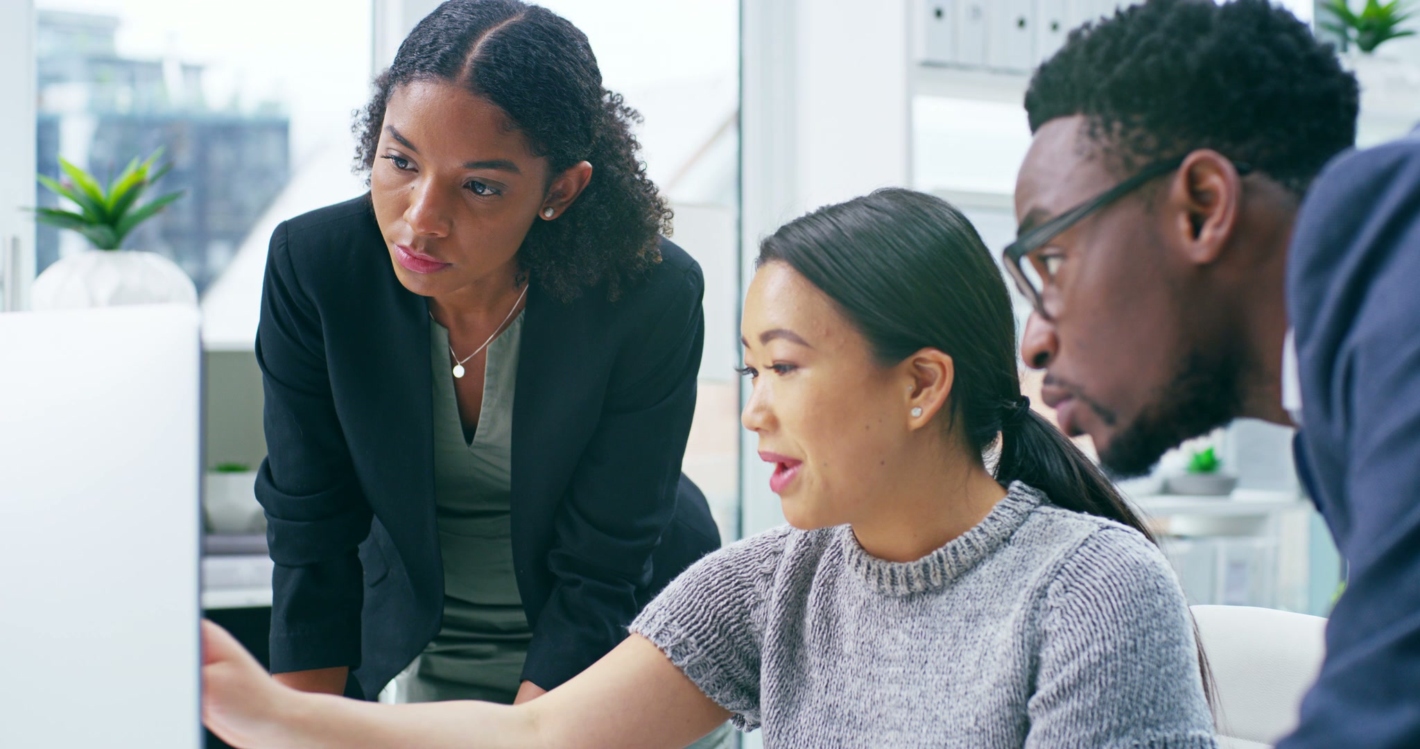 Entrepreneurs collaborating on an impact venture